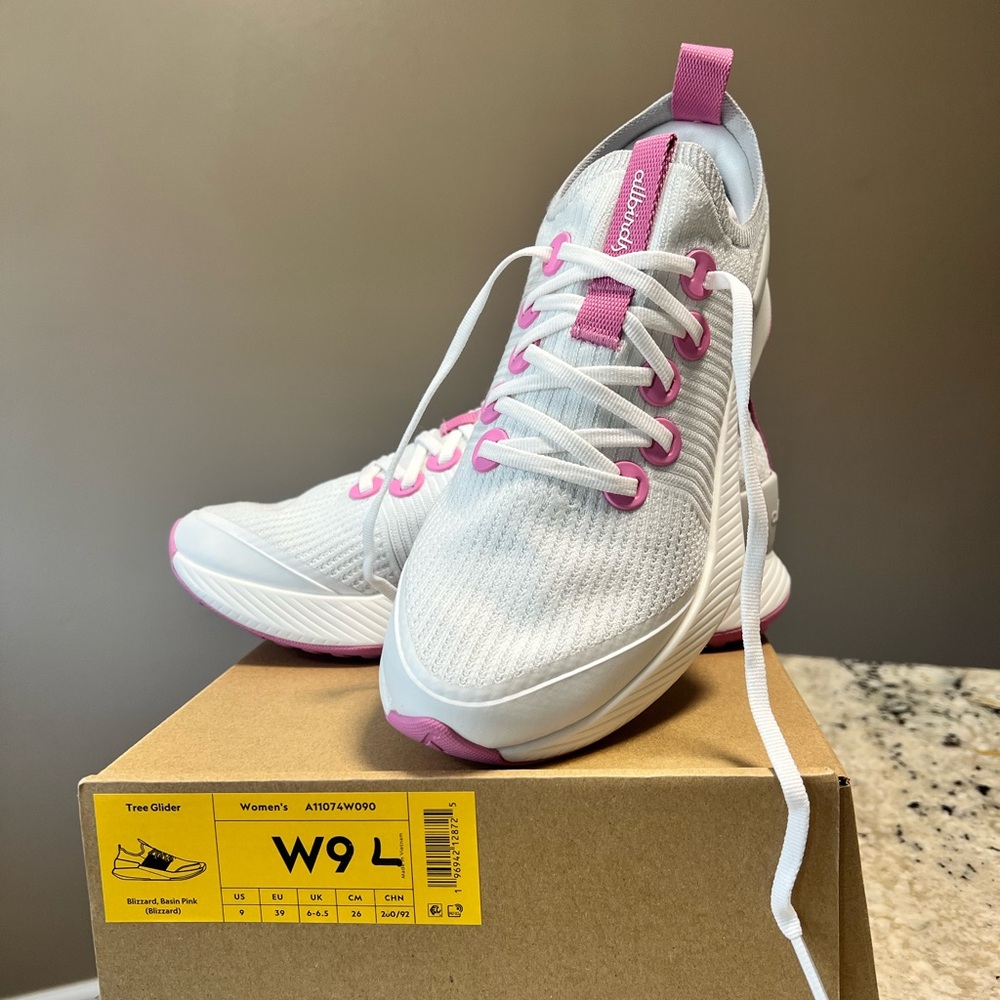 White and Pink Athletic Shoes